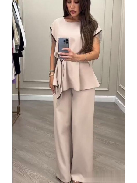 Костюм з бахромою камінців 