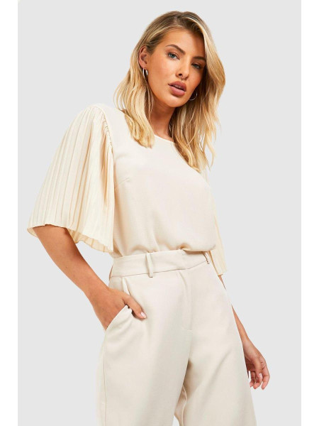 Кремова плетена блуза зі складками