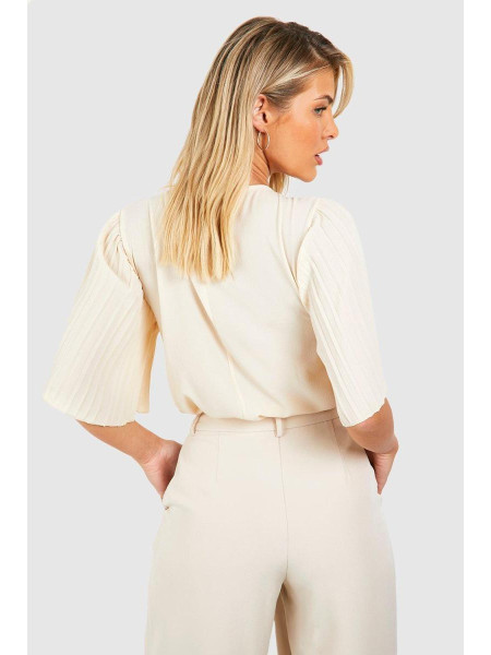 Кремова плетена блуза зі складками