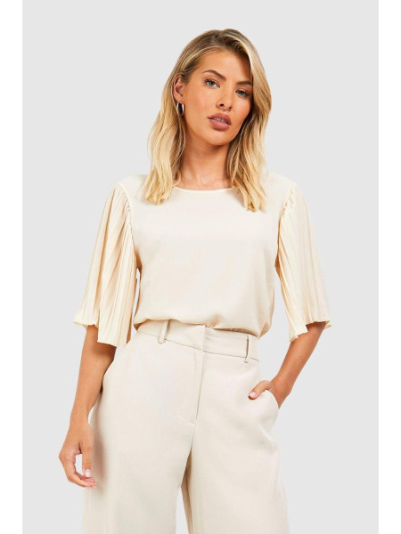 Кремова плетена блуза зі складками