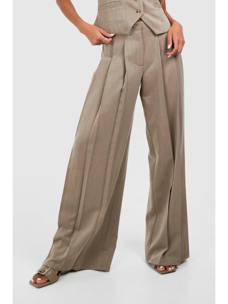 Широкі брюки зі складками