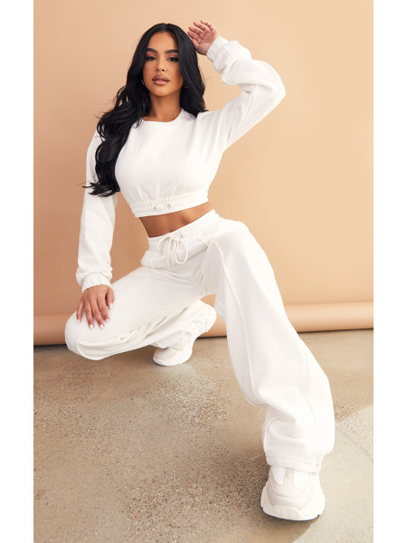 Маленькі кремові шви з широкими штанинами