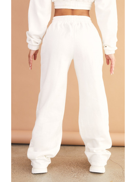 Маленькі кремові шви з широкими штанинами