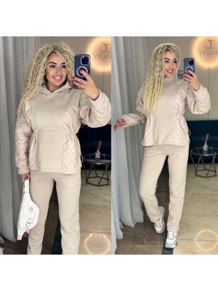 Костюм зі вставками плащівки 100 