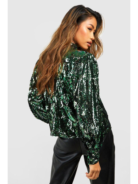 Рожевий об'ємний топ із паєтками з високим горлом