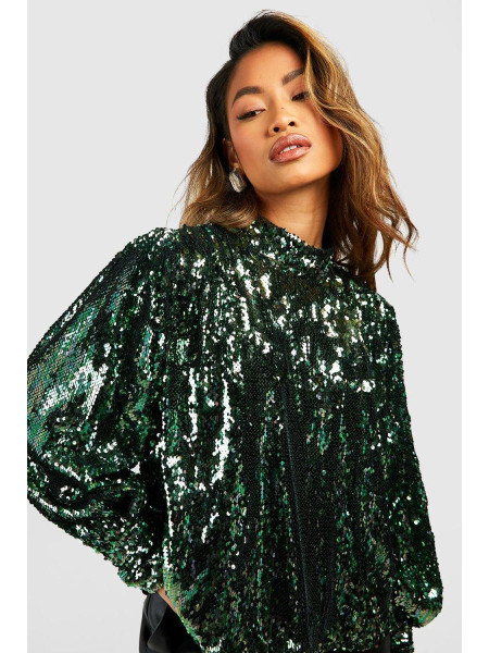 Рожевий об'ємний топ із паєтками з високим горлом