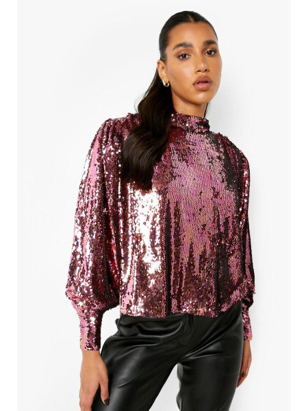 Рожевий об'ємний топ із паєтками з високим горлом