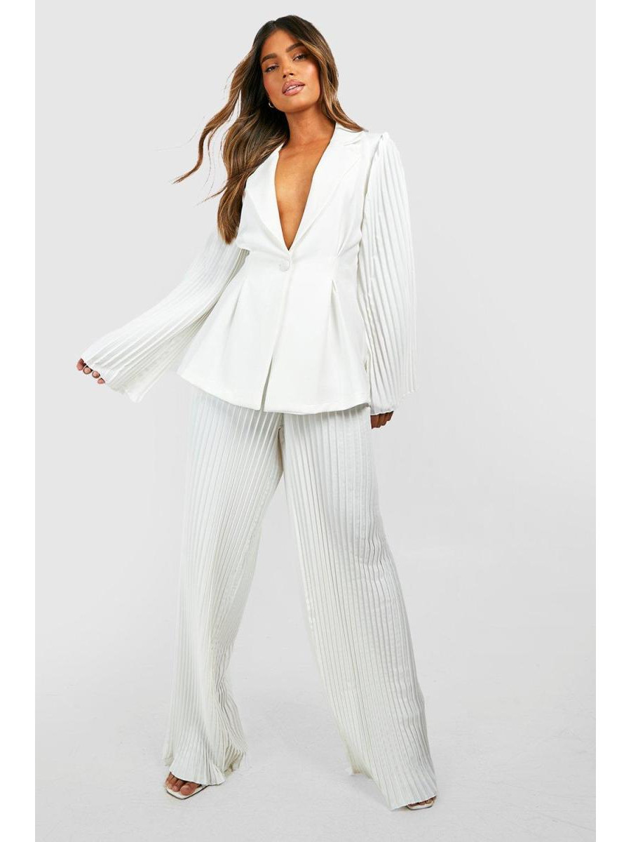 Штани з широкими штанинами в складку