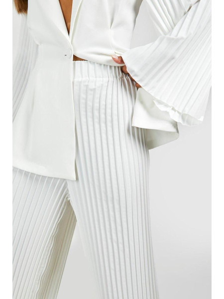 Штани з широкими штанинами в складку