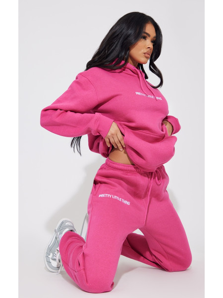 Яскраво-рожеві джоггери з вишивкою PRETTYLITTLETHING
