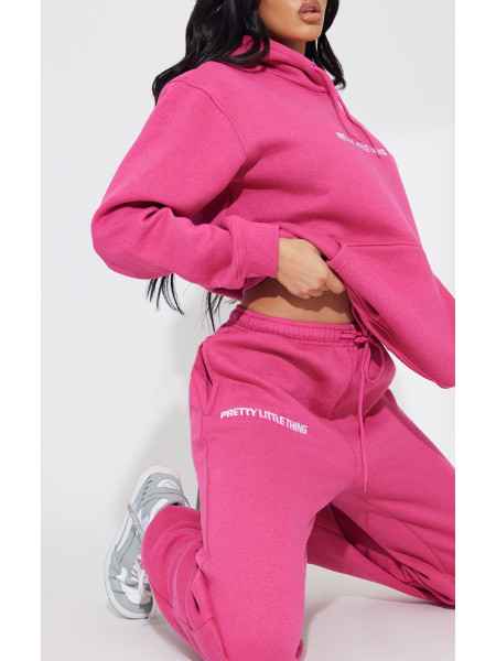 Яскраво-рожеві джоггери з вишивкою PRETTYLITTLETHING
