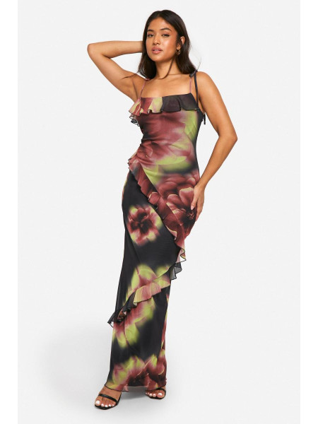 Маленька смілива максі-сукня з квітковими воланами