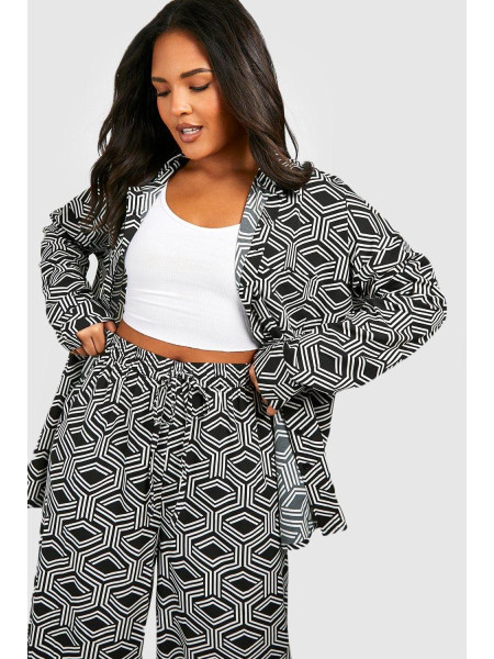 Чорна оверсайз-сорочка з географічним принтом