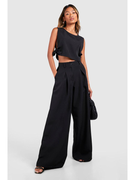 Широкі плісировані штани з високою талією