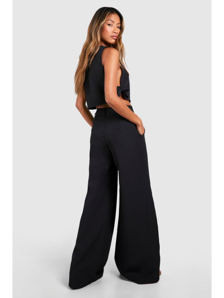 Широкі плісировані штани з високою талією