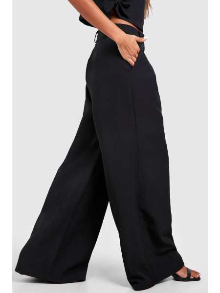 Широкі плісировані штани з високою талією