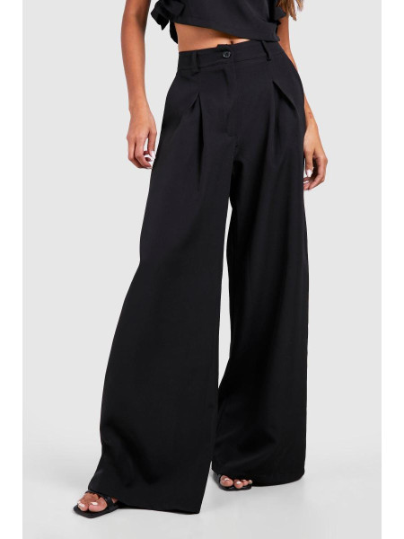 Широкі плісировані штани з високою талією