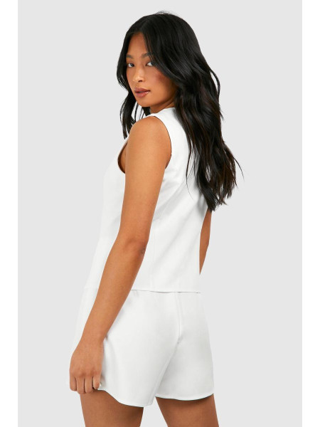 Маленький пошитий жилет