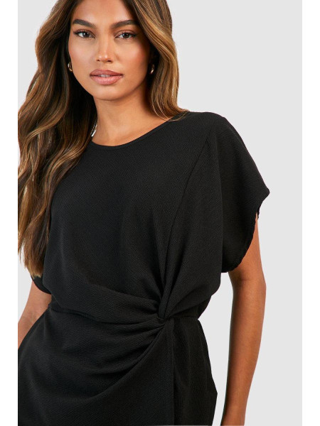 Чорна блузка зі складками