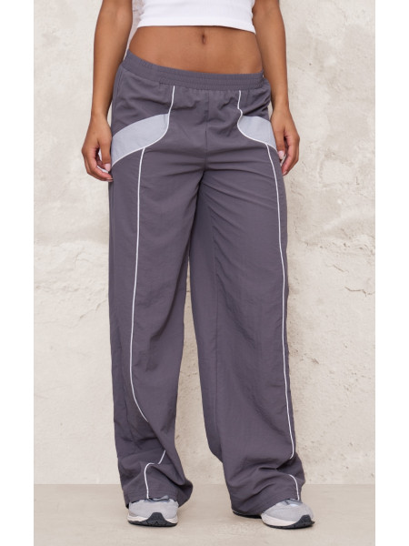 Широкі джоггери на блискавці темно-коричневого кольору з контрастною палітуркою