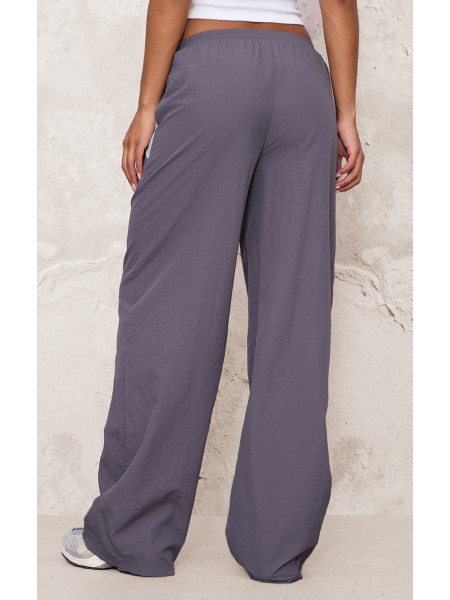 Широкі джоггери на блискавці темно-коричневого кольору з контрастною палітуркою