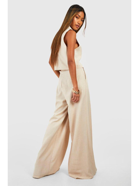 Широкі приталені брюки зі складкою спереду на льон